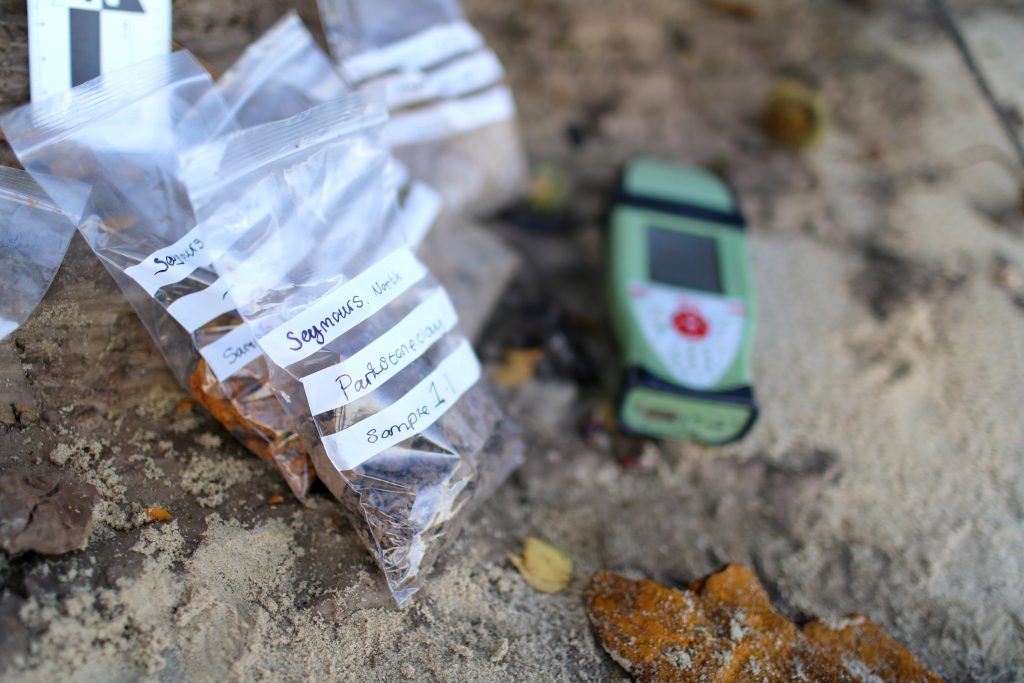 Soil sample bagged and written on by a Geologist, ready to be taken back to the laboratory to be dried and analysed